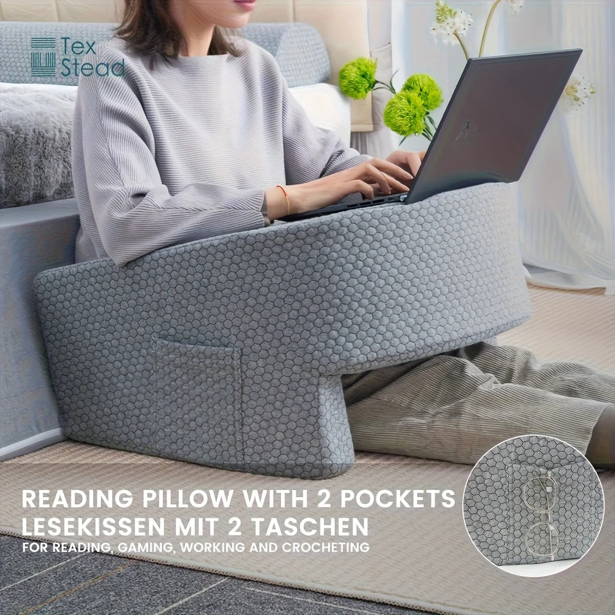 Person using a reading pillow with two pockets in a home setting.