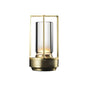 Decorative lamp with gold frame and glass shade on a white background