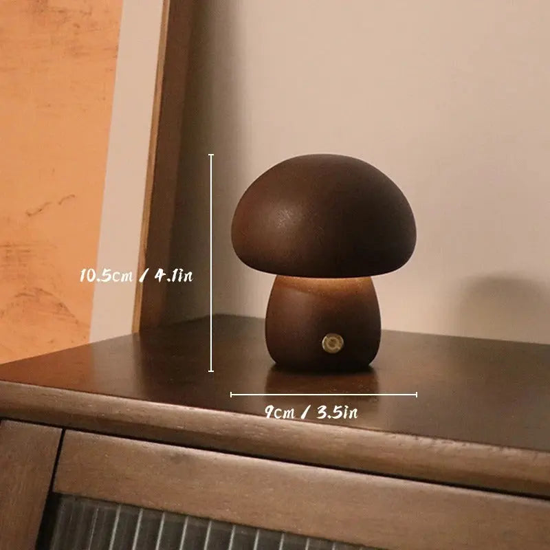 Mushroom-shaped lamp on a wooden surface with measurements indicated