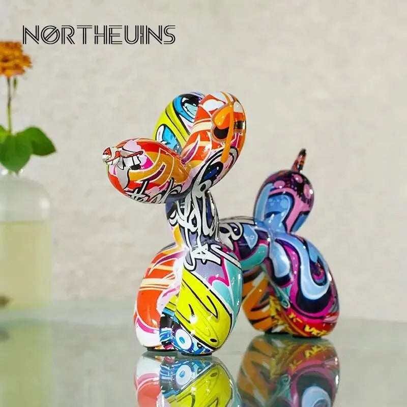 Colorful glass sculpture of a dog with 'NORTHEUINS' branding on a reflective surface.