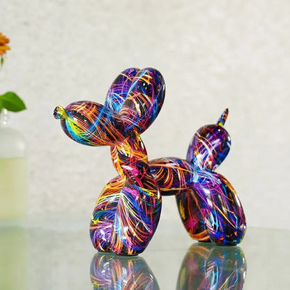 Colorful glass sculpture of a dog on a reflective surface with a blurred background