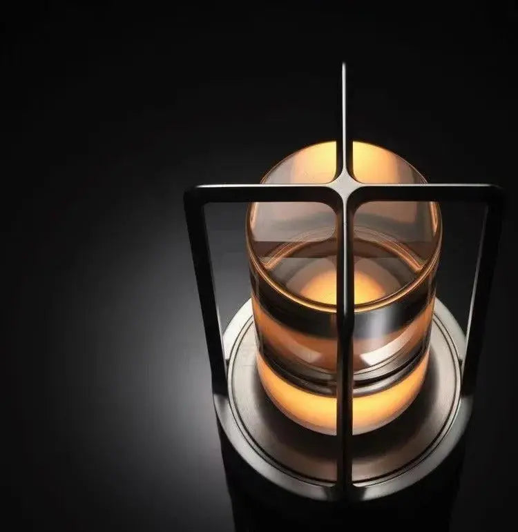 Decorative candle holder with a cross design on a dark background