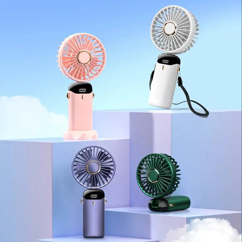 Four portable fans in different colors on a blue and white background