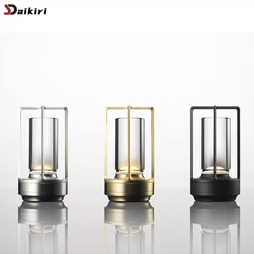Three decorative lanterns in silver, gold, and black on a white background with 'Daikiri' branding.