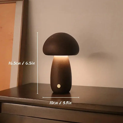 Mushroom-shaped lamp on a surface with measurements indicated