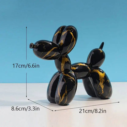 Black and gold balloon dog sculpture with measurements on a blue background