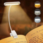 Booklight on an open book with three light intensity settings shown.