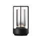 Black outdoor lantern with glass cover on a white background